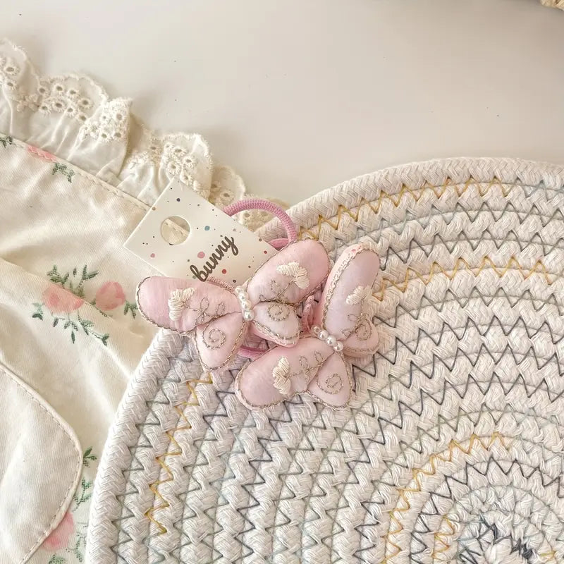 Rankų darbo siuvinėtos gumytės "Rožiniai drugeliai"