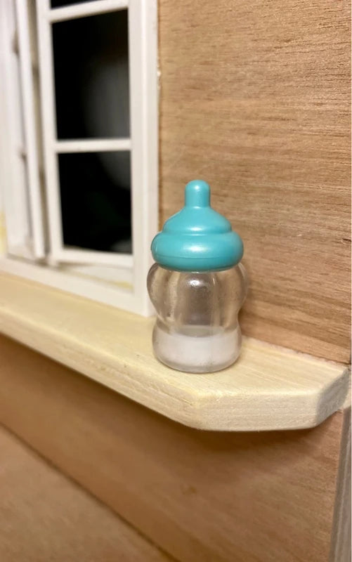 Lėliukas su žirgu - supynėmis + buteliukas